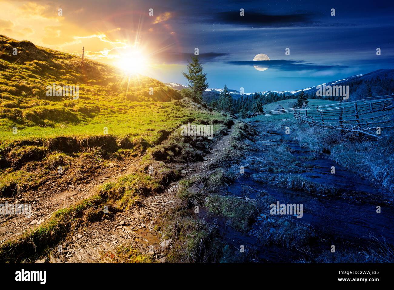 karpaten Landschaft auf Frühlingsequinox. Bergige ländliche Landschaft unter einem Himmel mit Sonne und Mond. Tag- und Nachtzeitwechsel Stockfoto