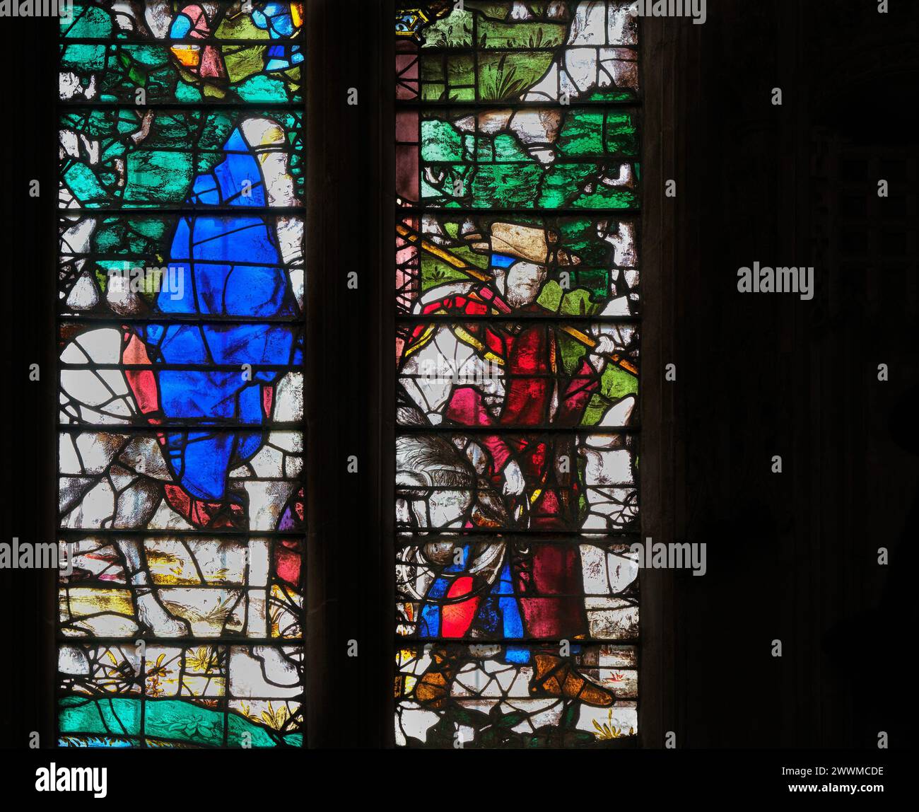 Joseph, mit Maria und dem Baby Jesus Christus auf einem Esel, flieht nach Ägypten, um dem mörderischen Amoklauf des Königs Herodes zu entgehen; King's College Chapel, University of Cambridge, England. Stockfoto