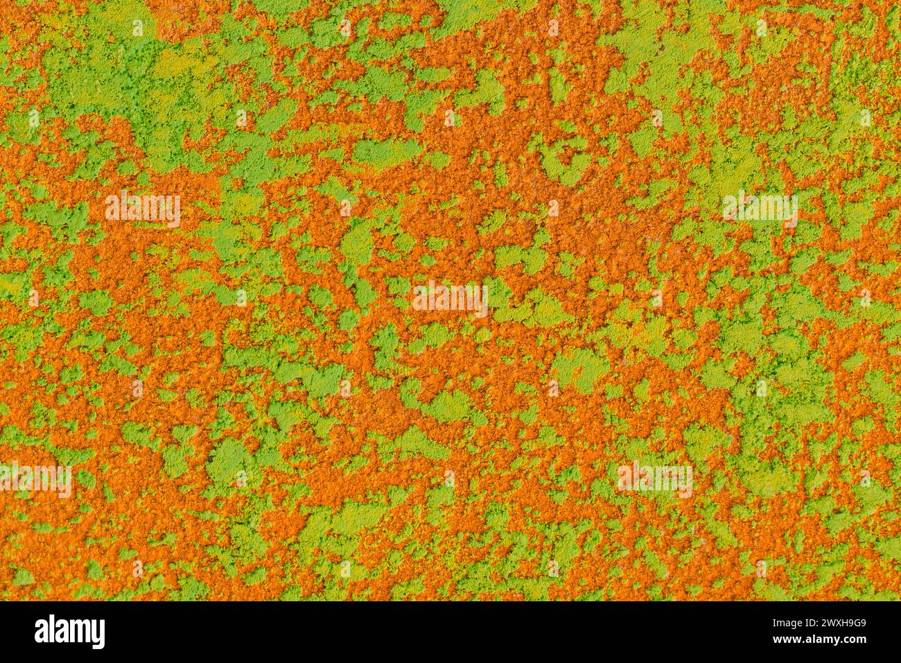 Abstrakte raue Farbmuster Wand gelb und orange helle Textur Hintergrund Zementstruktur Betongrunge. Stockfoto