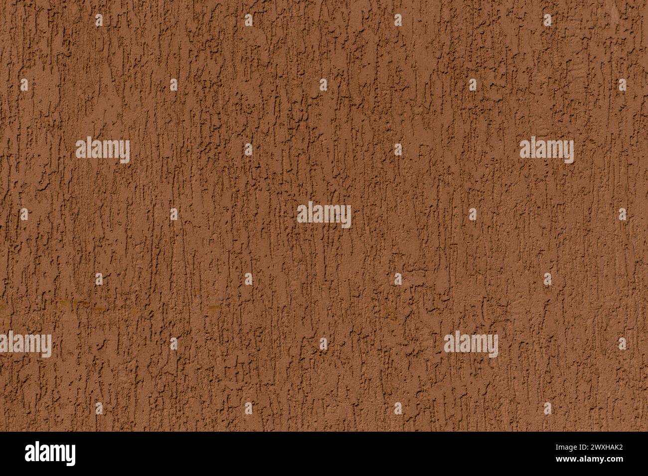 Brauner massiver Wandputz grobes abstraktes Muster Stuck Textur Hintergrundstruktur Hintergrund. Stockfoto