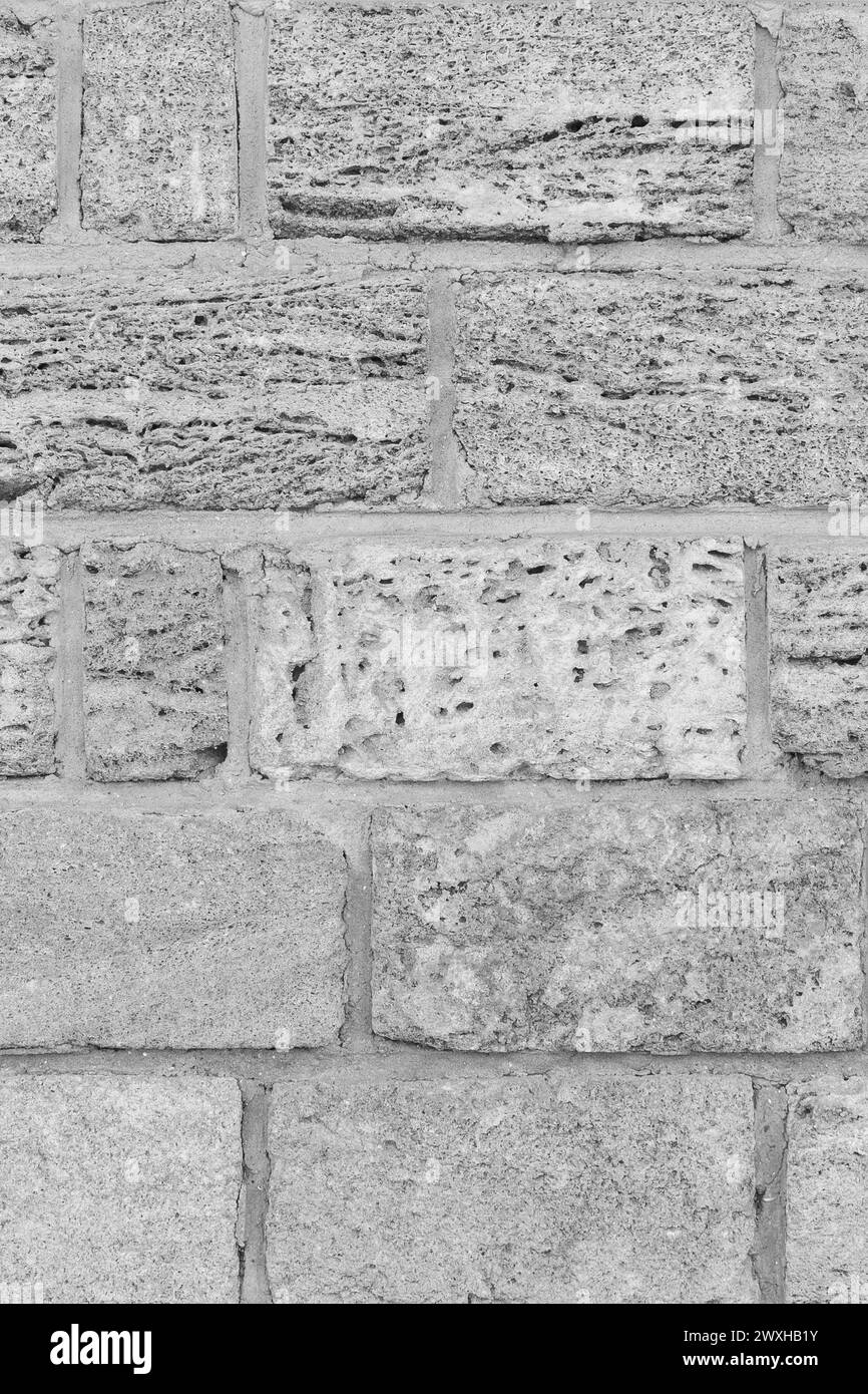 Helles Natürliches Grau Schale Ziegelstein Wand Textur Sand Struktur Hintergrund Kalkstein Weiß. Stockfoto