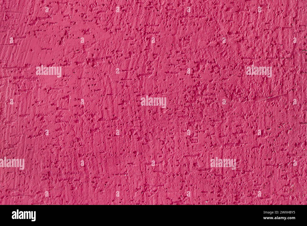 Rosa Farbe auf Betonwandoberfläche Gips Textur Stuck Hintergrund abstrakte purpurrote Farbe Zement. Stockfoto