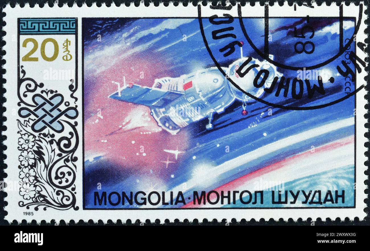 Briefmarke, gedruckt von der Mongolei, die die Raumfahrtforschung fördert. Stockfoto