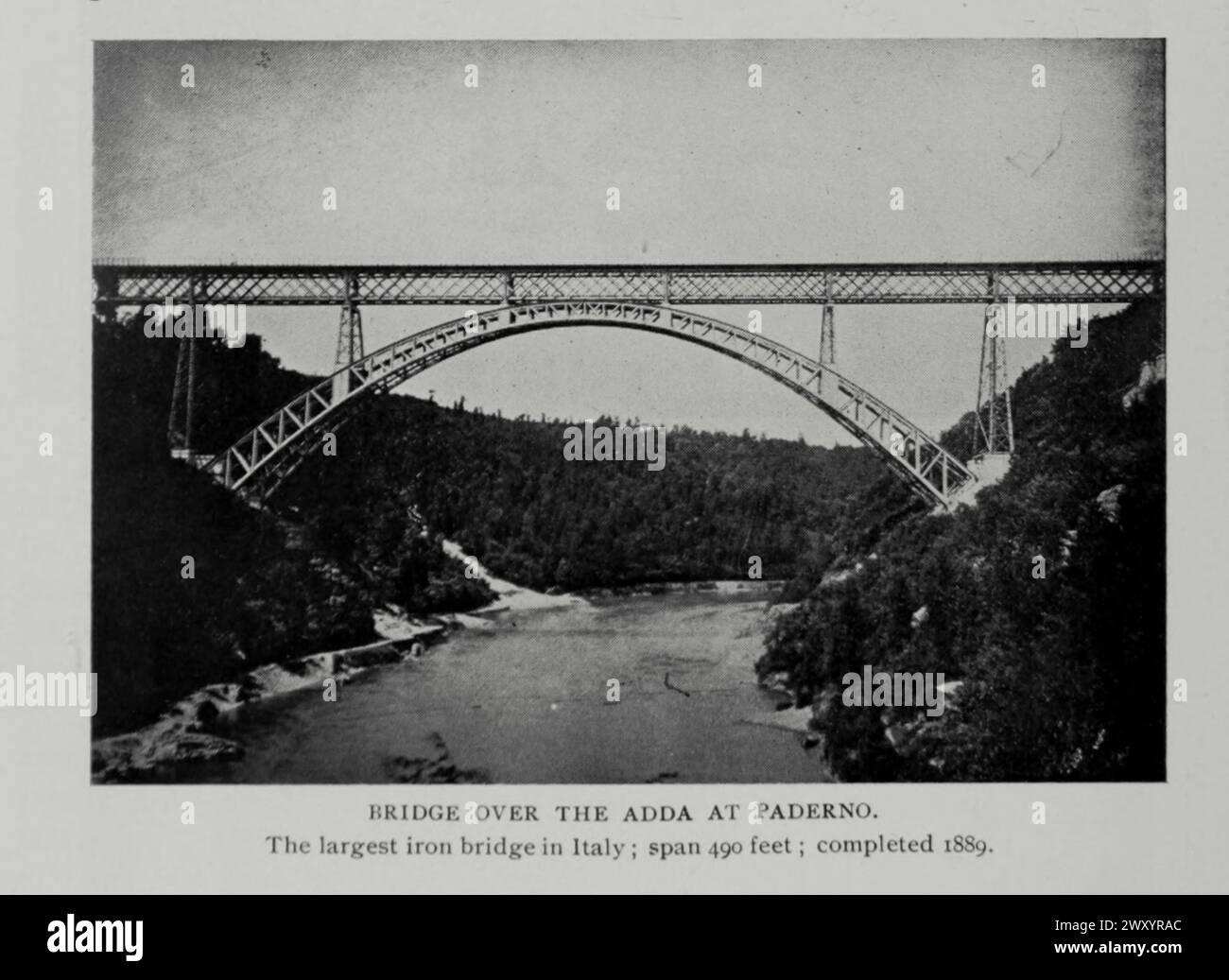 Brücke über den Fluss Adda bei Paderno, Italien die größte Eisenbrücke Italiens; über 490 m Länge; fertiggestellt 1889. Aus dem Artikel EUROPÄISCHER UND AMERIKANISCHER BRÜCKENBAU. Von Gustav Lindenthal. Vom Engineering Magazine widmet sich Industrial Progress Band XV 1898 The Engineering Magazine Co Stockfoto