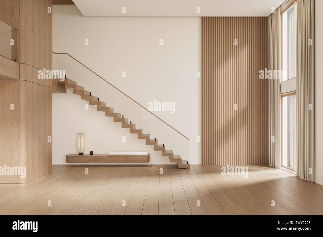 Offenes Wohnzimmer und Küche mit großen Fenstern, TV-Wand, grauem Sofa, Holzpaneelen und Treppen. Moderne Designlösung Stockfoto