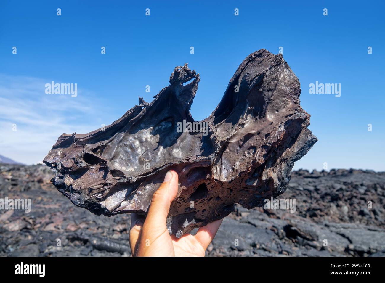 Verschiedene Formen basaltverfestigter Lava (Klinker): hawaiianisch ist die wichtigste Lava-Art (aa-Lava). Viskoses, dermolithisches Lavasampl (Unterseite der Lava Stockfoto