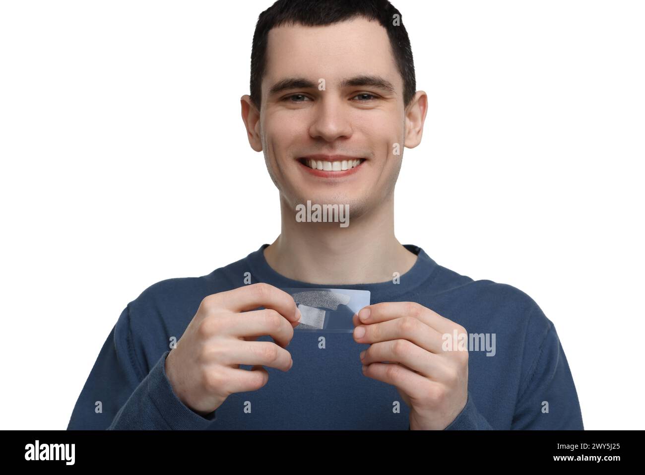 Junger Mann mit aufhellenden Streifen auf hellem Hintergrund Stockfoto