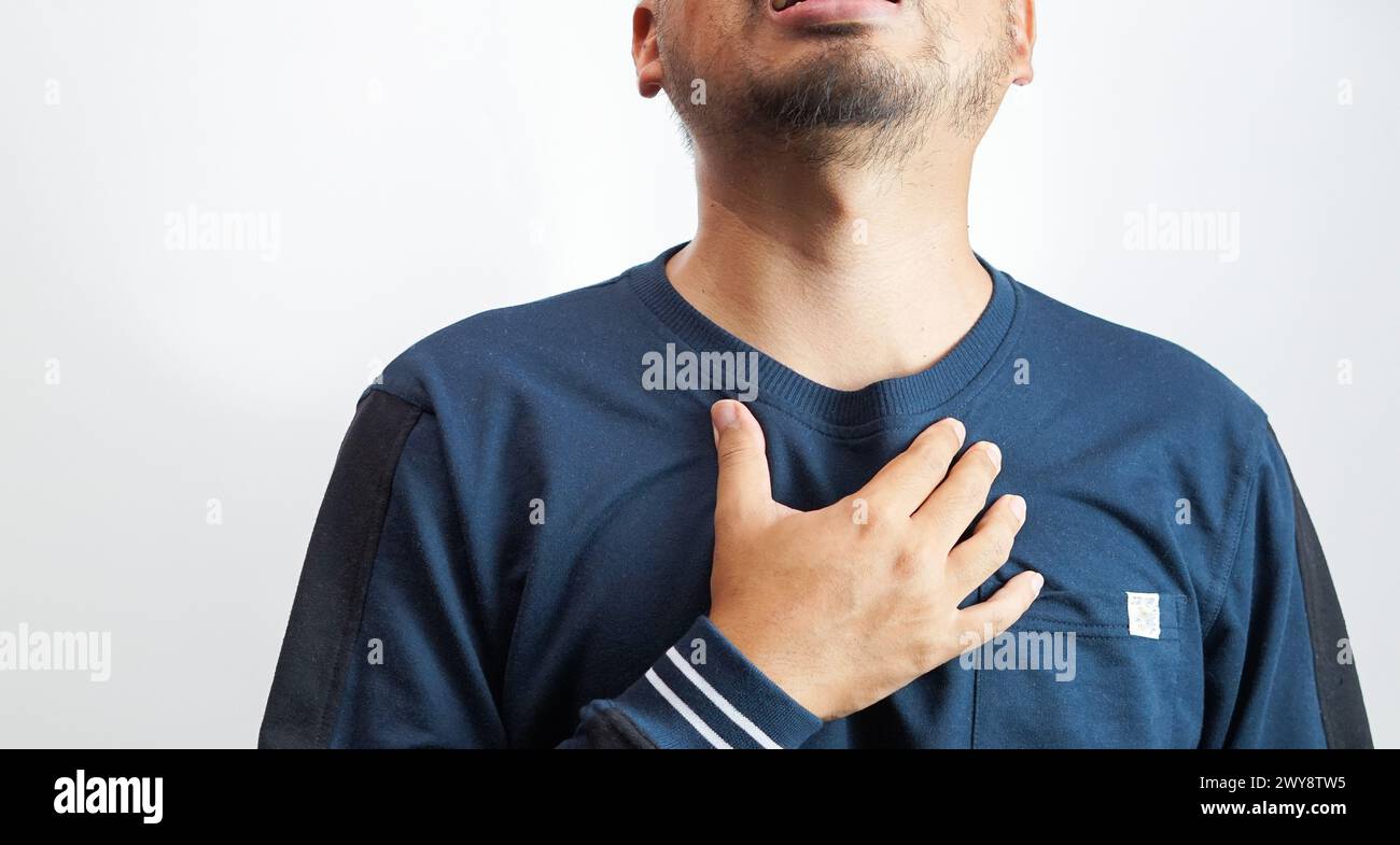 Halsschmerzen, Hände halten den Hals und halten die Halsschmerzen zurück Stockfoto