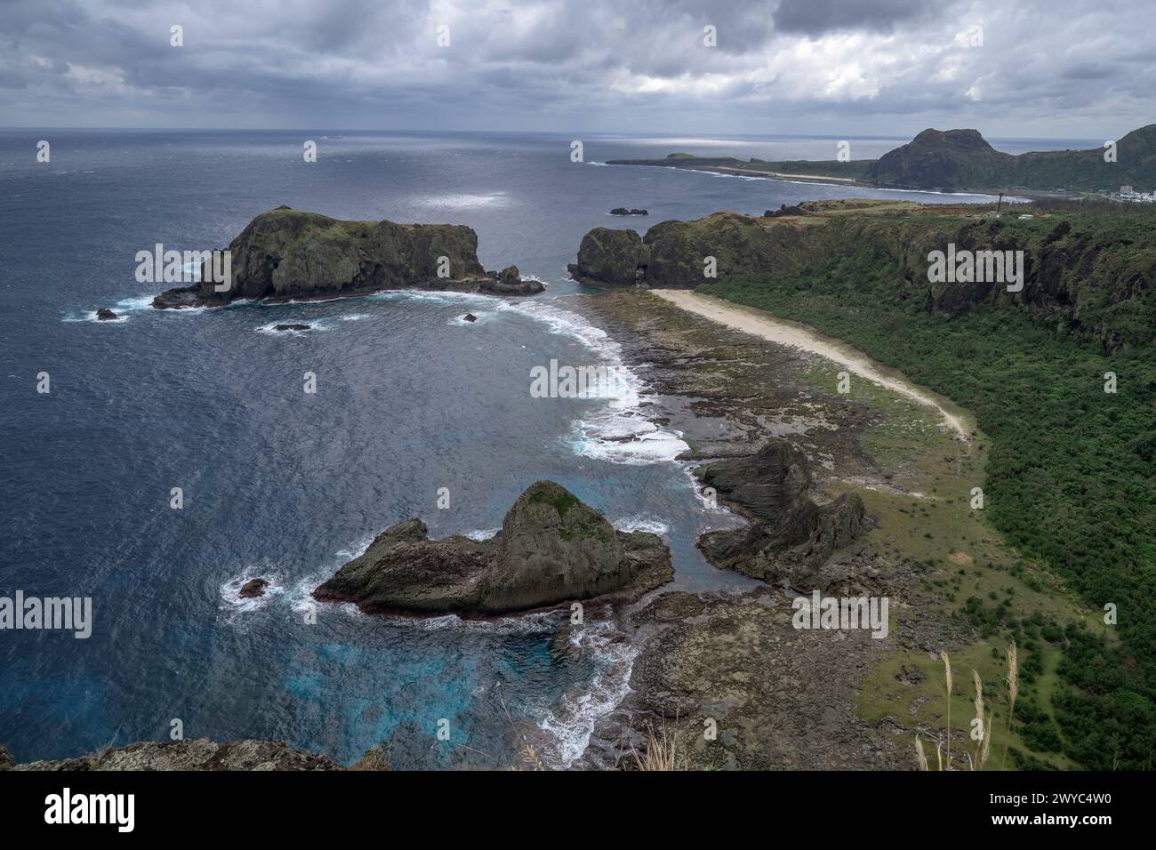 Aus der Vogelperspektive auf die zerklüftete Küste der Green Island Stockfoto