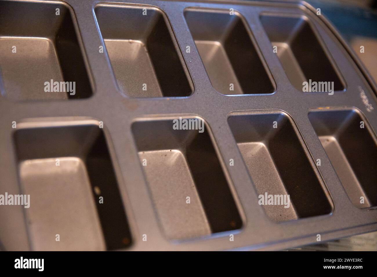 Mini-Pfannen zum Backen von Muffins Stockfoto