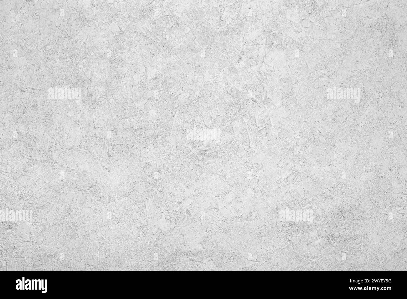Abstrakter Hintergrund der Betonsteinwand. Die Textur der Steinoberfläche. Alte abgenutzte Betonwand Stockfoto