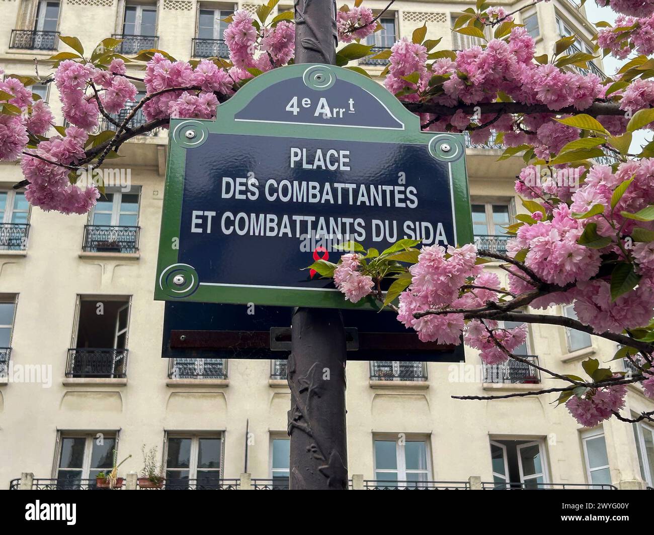 Paris, Frankreich, Detail, Straßenschild im Viertel Marais, Place des Combattants du SIDA (AIDS Fighters Plaza) Widmung Geschichte (Rue de Rivoli) Stockfoto