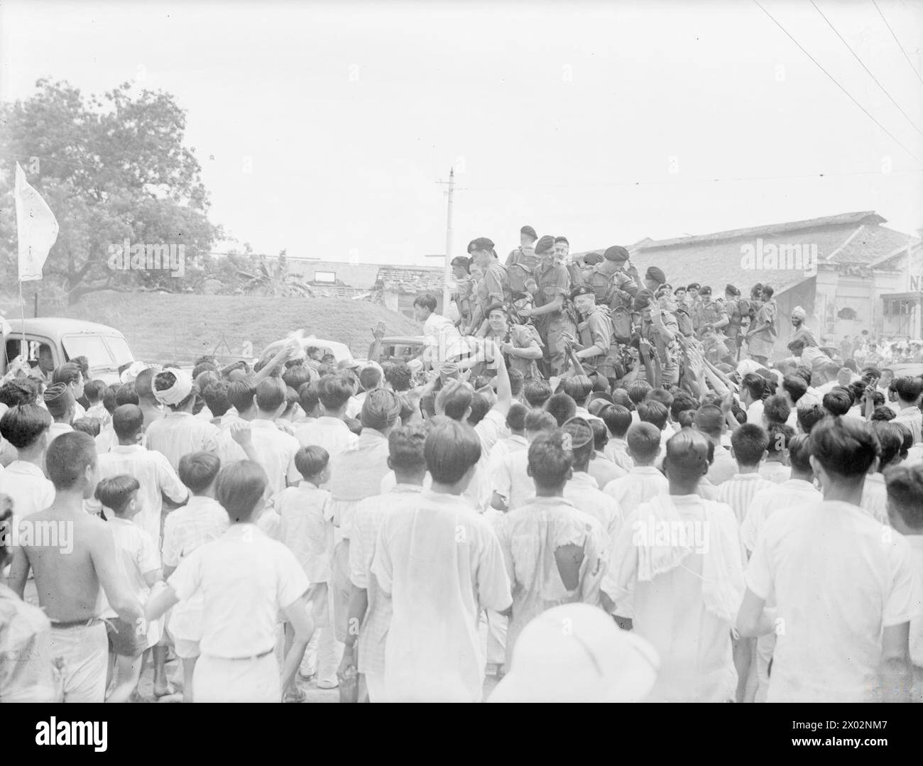 Am 3. September 1945 besetzten die britischen Royal Marines die Penang-Strait-Siedlung und übernahmen nach drei Jahren die Kontrolle von den japanischen Truppen. Stockfoto