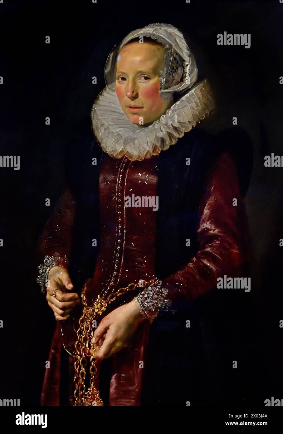 Porträt einer Frau 1612 Frans Hals, 1582-1666, Antwerpen-Haarlem, Niederländisch, Niederlande, 17. Jahrhundert, niederländisches Goldenes Zeitalter ( Sie trägt eine Spitzenmütze, ein schwarzes Seidenkleid, eine Rüsche und Spitzenarmbänder. Links ist ein Wappen ) Stockfoto