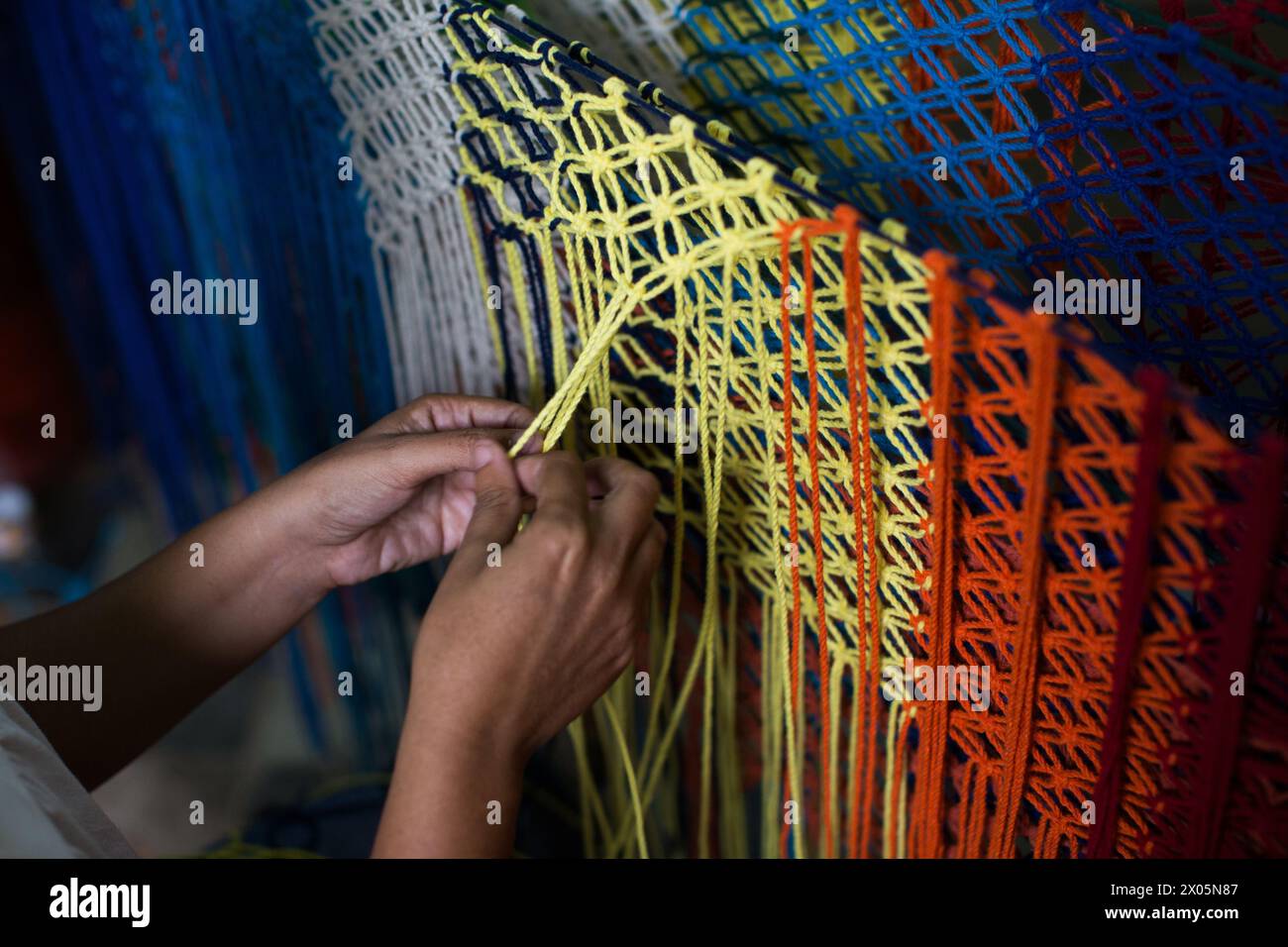 Ein Sozialunternehmen, das Hängematten herstellt, bietet Arbeitsplätze für Menschen mit Behinderungen in Granada, Nicaragua Stockfoto