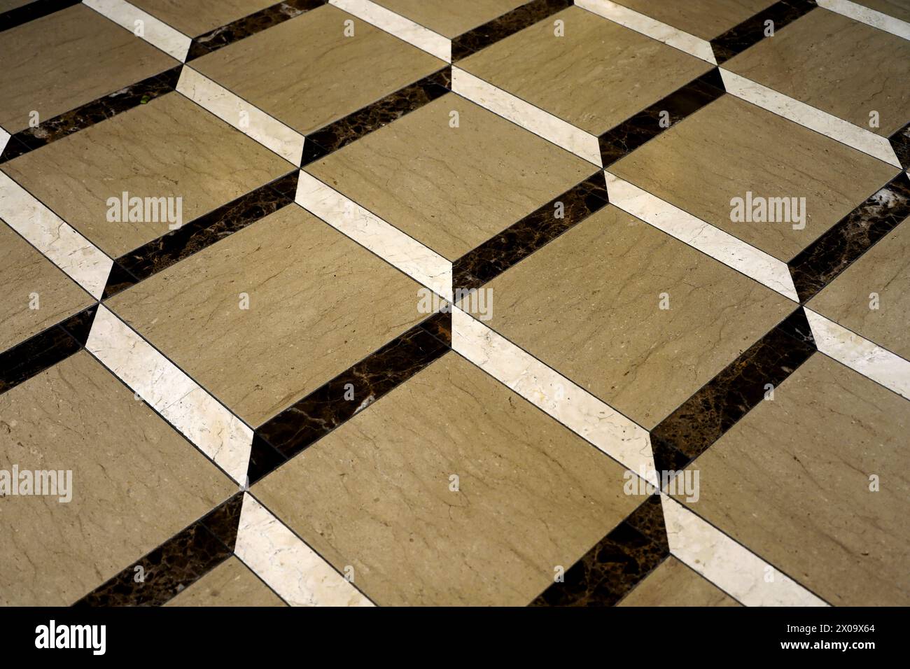 Hintergrundmaterial, das eine Nahaufnahme eines dreidimensionalen Bodens mit drei Fliesentypen zeigt Stockfoto