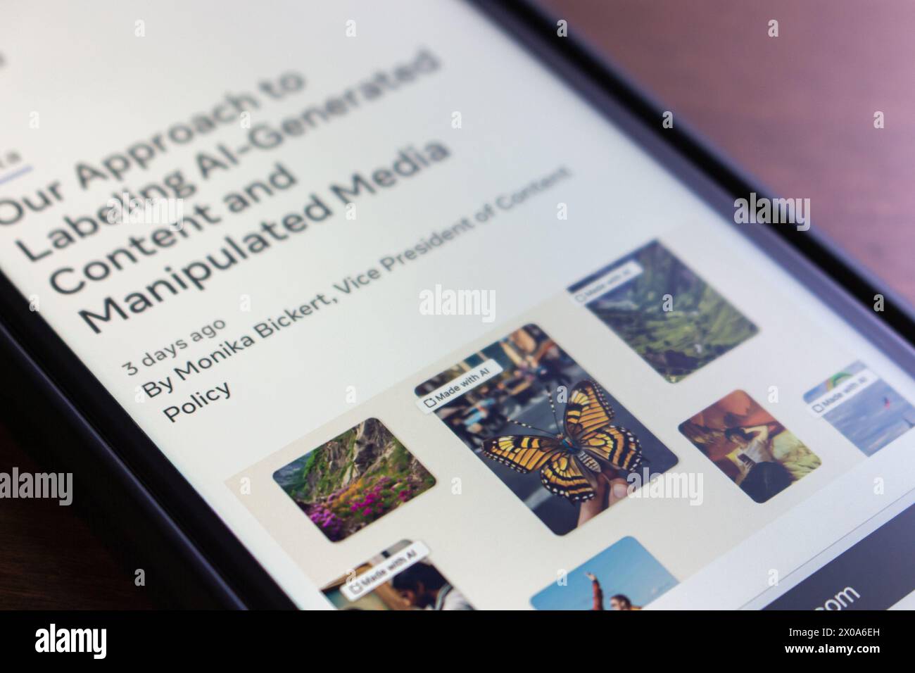 Ein Beitrag „Our Approach to Labeling AI-Generated Content and Manipulation Media“ von Newsroom von Meta Platforms, inc. Auf einem iPhone-Bildschirm Stockfoto