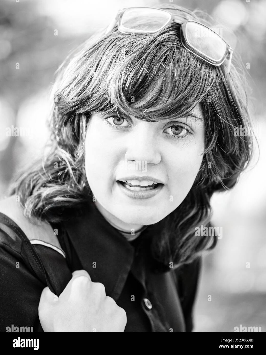 Student mit Brille und Rucksack Stockfoto