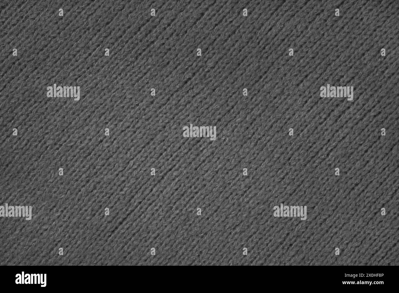 Schwarzes Wolljersey-Strickgewebe mit diagonaler Webstruktur, Pullover, Hintergrund mit Pullover-Struktur. Abstrakter Hintergrund aus Stoff, Stofftapete Stockfoto