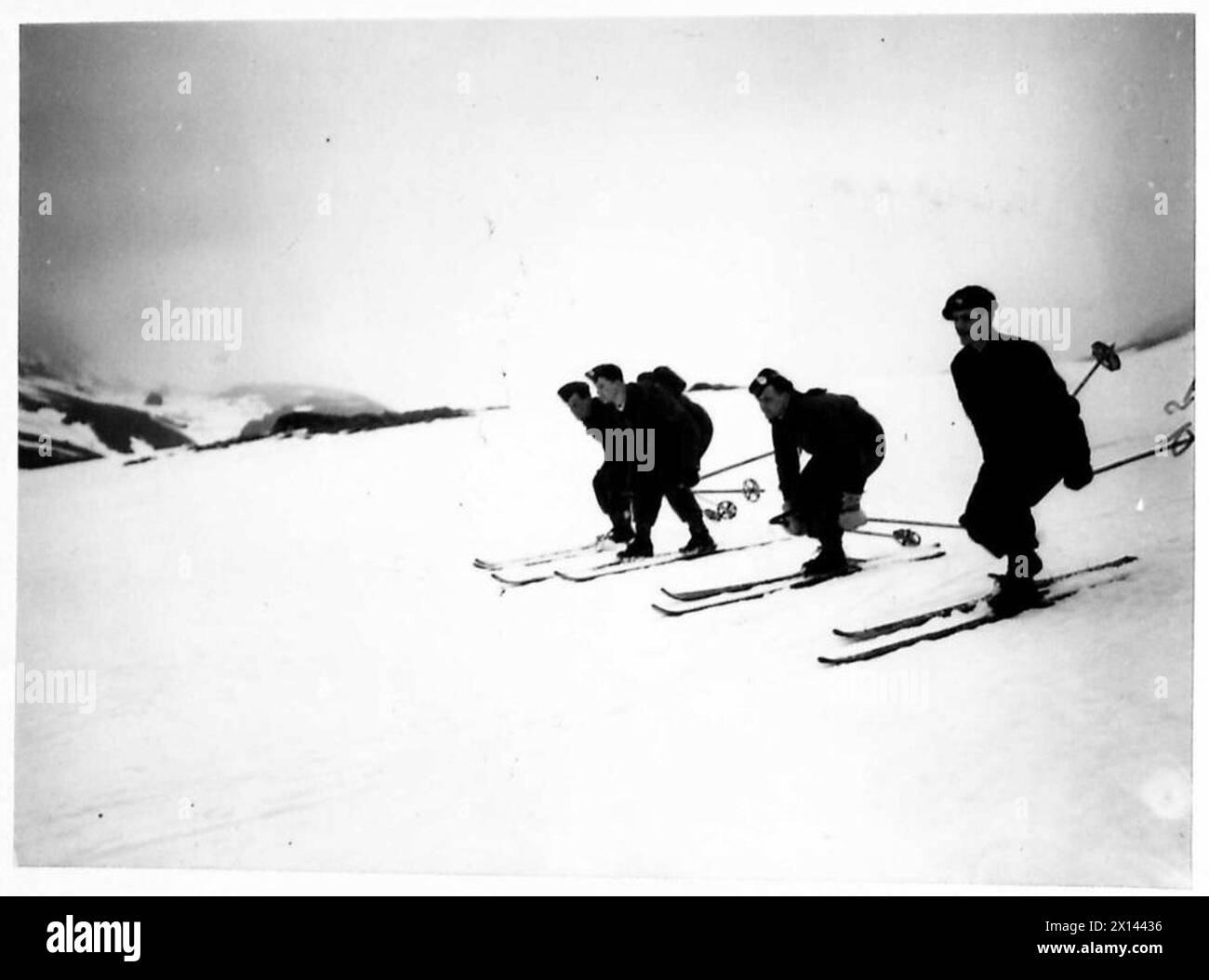 Die Truppen beginnen ihren Abstieg während einer Skiübung der British Army Stockfoto