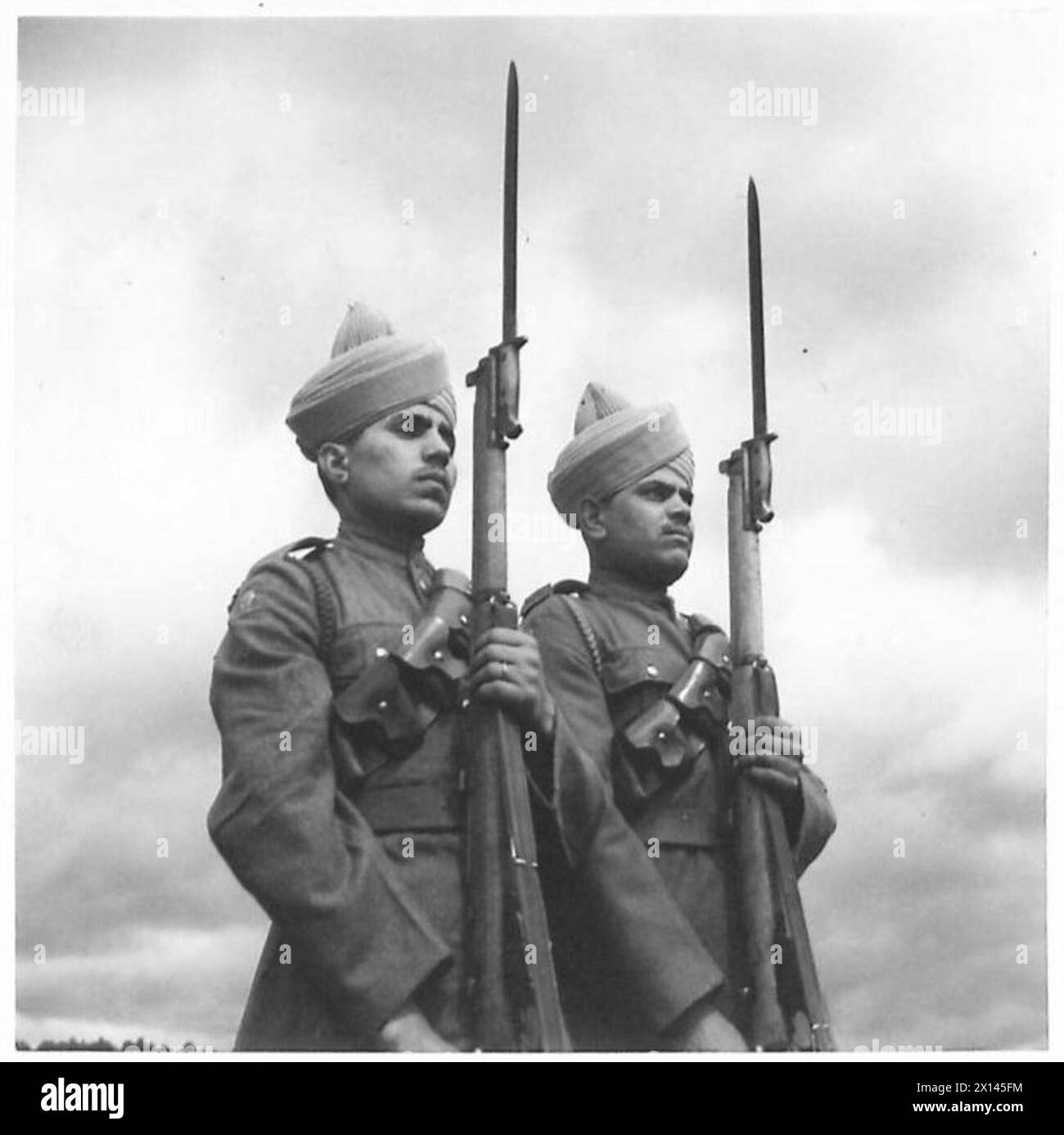 Mitglieder des Royal Indian Army Service Corps im Wachdienst, die typische Aufgaben innerhalb der britischen Armee wahrnehmen. Stockfoto
