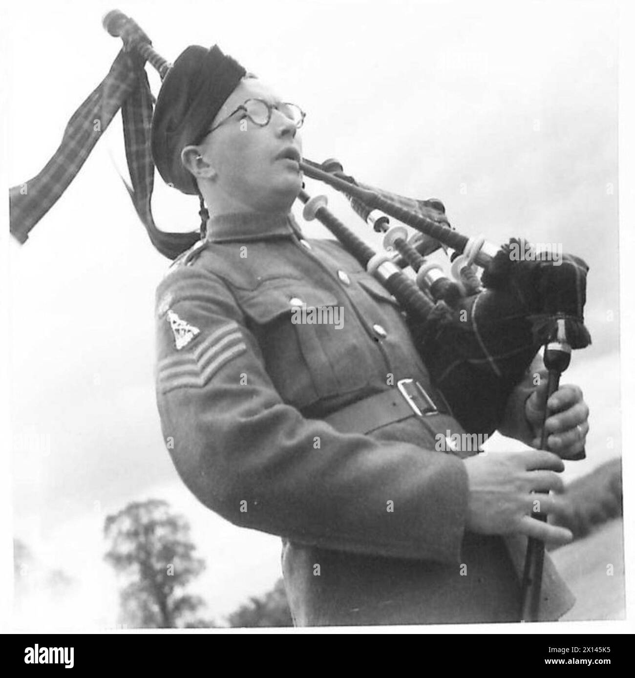 Pipe Sergeant Jock Campbell gründete und leitet die Pioneer Company Pioneer Company, die musikalische Unterstützung und zeremonielle Aufgaben für die britische Armee leistete. Stockfoto