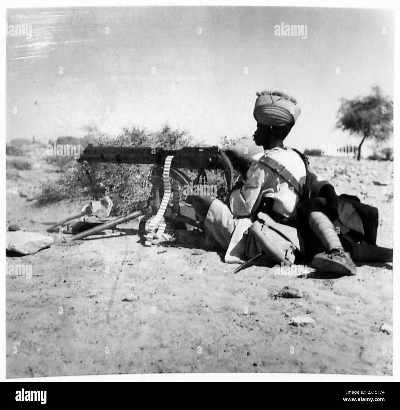 Ein Vickers-Maschinenschützer der Sudan Defence Force ist in Fotografien zu sehen, die von der britischen Armee dokumentiert wurden. Stockfoto