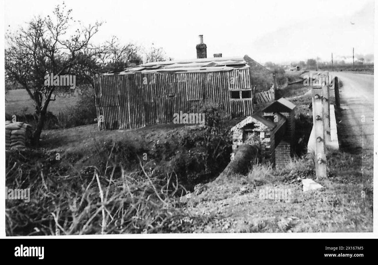 Das 2. Korps der britischen Armee verwendet Tarntechniken, um Personal, Fahrzeuge und Ausrüstung während der Operationen zu verbergen. Stockfoto