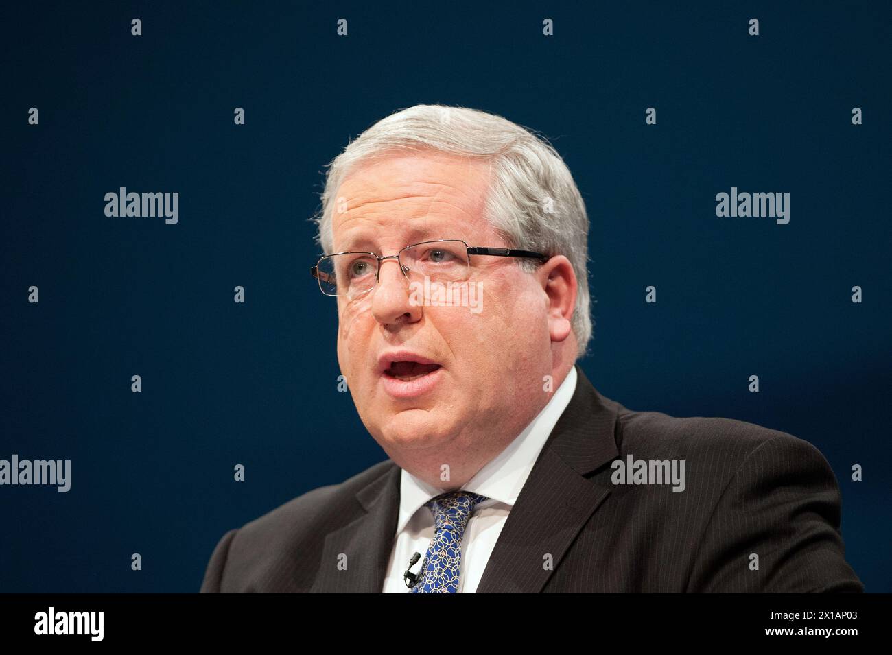 Verkehrsminister Patrick McLoughlin spricht während der Konservativen Konferenz 2013 in Manchester Central vor den Delegierten. Stockfoto