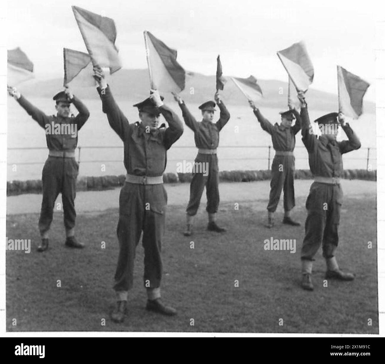 Im Waterborne Training Centre der R.A.S.C., nehmen Soldaten an einer Flaggensignalklasse teil, die Kommunikationstechniken unter Anleitung der British Army erlernt. Stockfoto