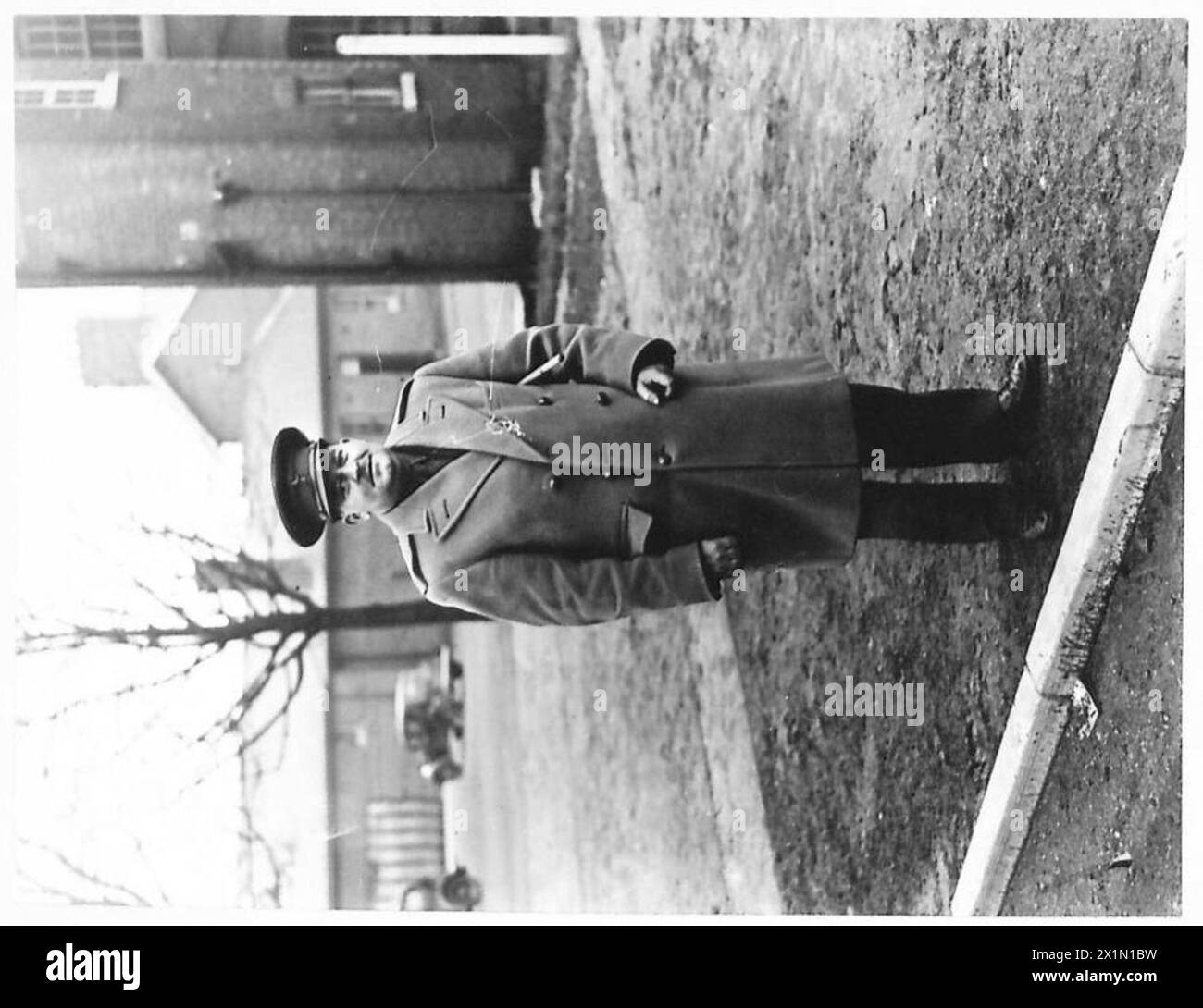 Major E. W. Belcher, MBE, der als Catering Adviser des Aldershot Command der British Army dient, ist in einem offiziellen Porträt abgebildet. Stockfoto