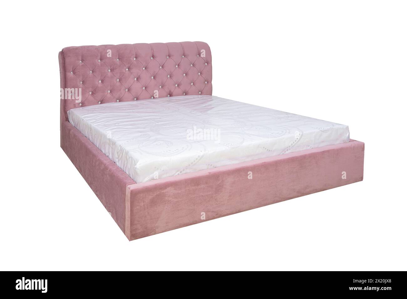 Doppelbett mit weichem Kopfteil. Gepolsterte Möbel. Stockfoto