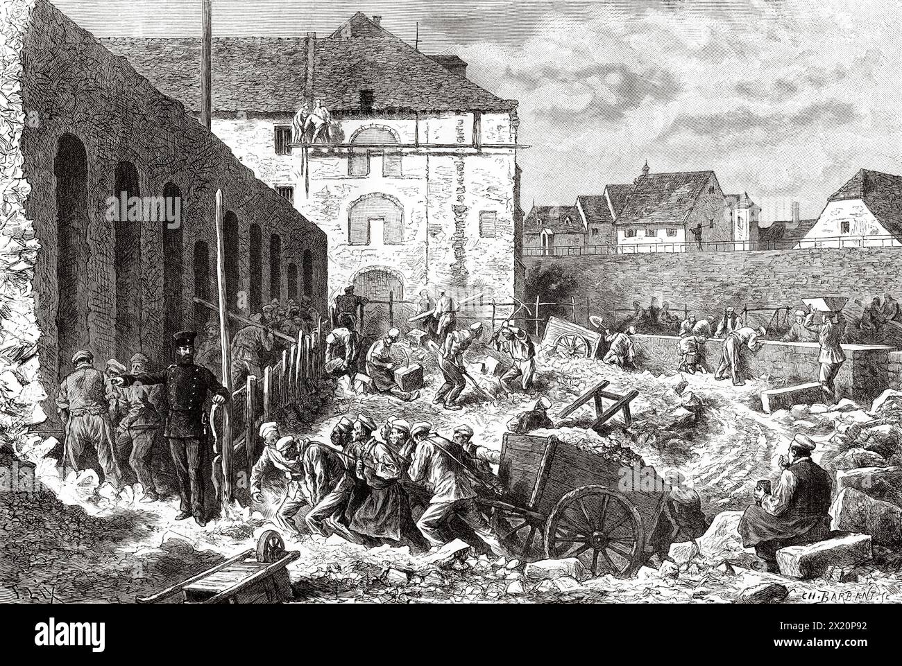 Gefangene des Zentralhauses, die auf den Fundamenten des Zellgefängnisses Ensisheim im Elsass arbeiten. Zeichnung von Frédéric Théodore LIX (1830–1897) durch Elsass und Lothringen, 1884 von Charles Grad (1842–1890) Le Tour du Monde 1886 Stockfoto