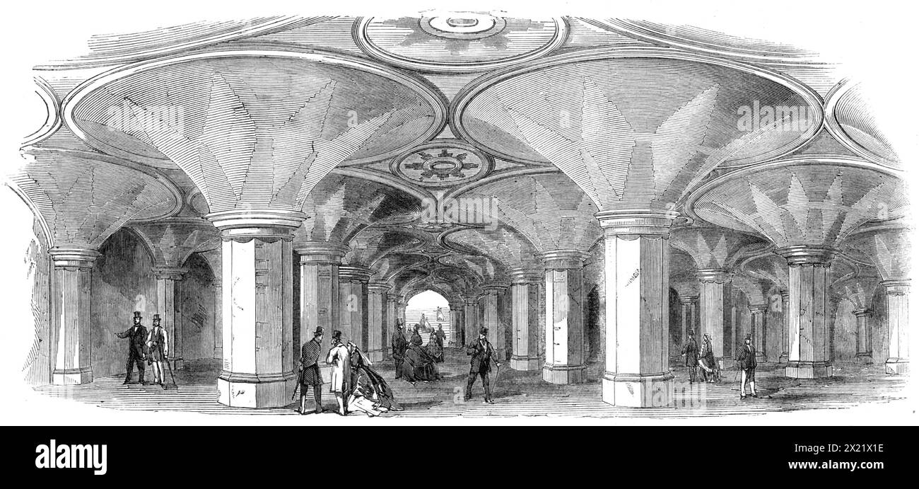 U-Bahn der neuen High-Level-Station am Crystal Palace, [Sydenham], 1865. „Die South London and Crystal Palace Railway... ist jetzt mehrere Wochen geöffnet... die überlegene Bequemlichkeit der neuen Crystal Palace Station wird bereits von vielen Besuchern wahrgenommen...[die in der Lage sind] den mühsamen Spaziergang auf einer halben Meile von Korridoren und Treppen zu vermeiden, die denen auferlegt werden, die mit der Linie der Brighton Company ankommen Bahnsteig des Bahnhofs befindet sich auf einer Ebene mit dem unteren Stockwerk (in der Maschinenabteilung) des Kristallpalastes, und die Bahngäste haben leichten Zugang über eine schöne und gut beleuchtete U-Bahn (40 m) Stockfoto