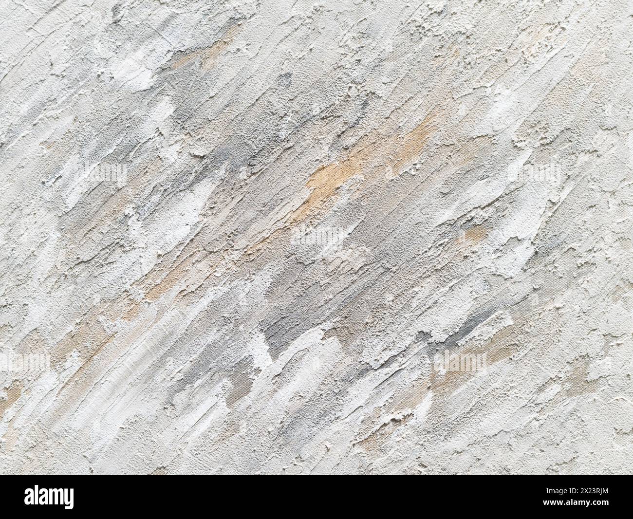 Abstrakter Strukturhintergrund mit Texturpaste. Grau-weiß-Kontrast mit orangefarbener Farbe. Stuckfüller auf einer Kunstfläche. Stockfoto