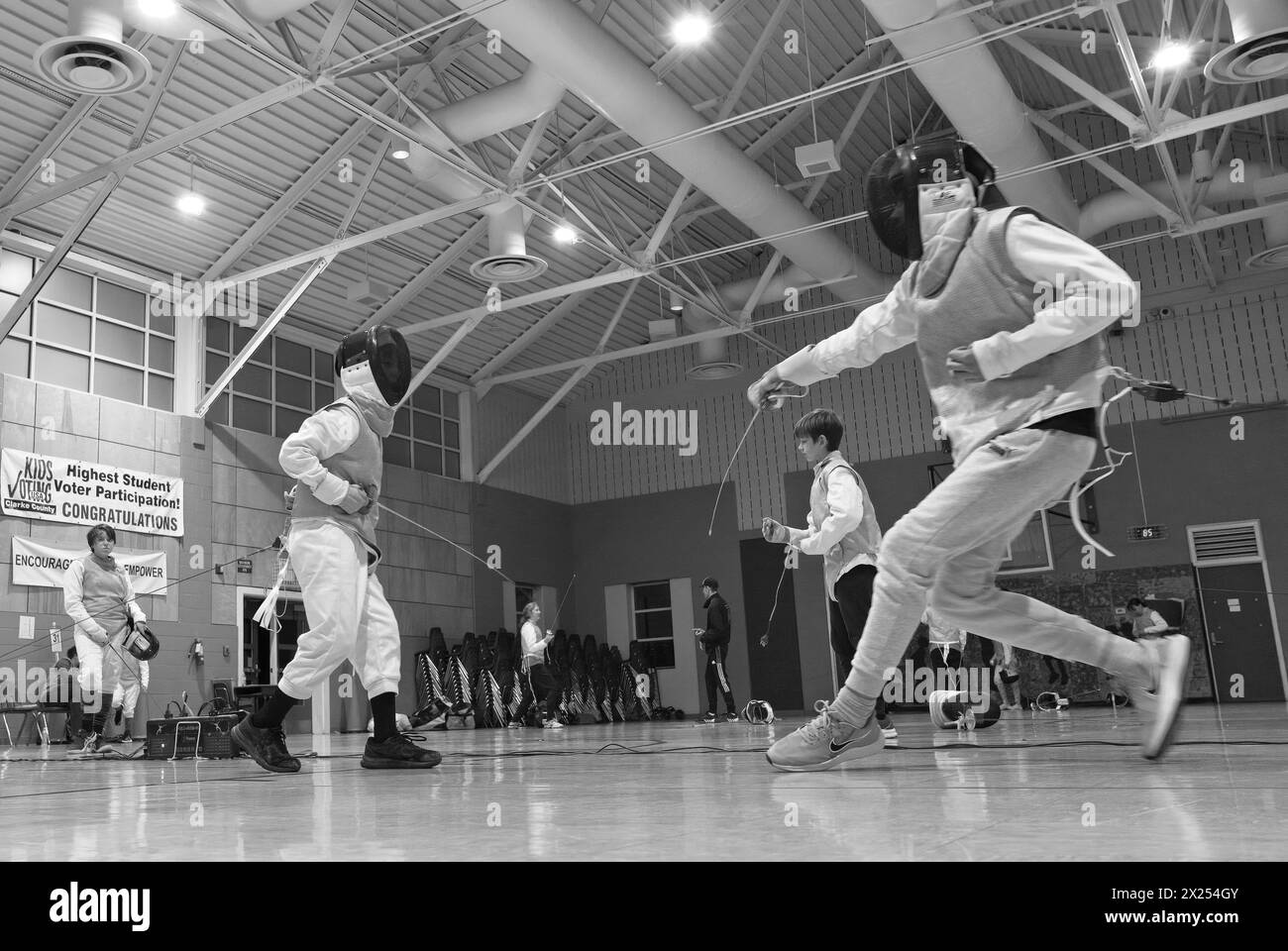 USA - 19.04.2024: Out of Nowhere Fencing, bietet Unterricht im Fechten für alle Niveaus unter dem wachsamen Auge von Trainer David C. Stockfoto