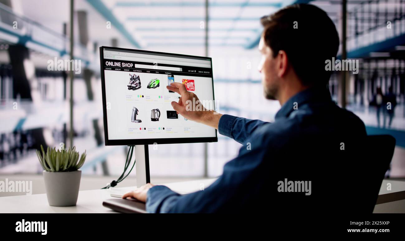 Mann, Der Den Online-E-Commerce-Shop Auf Dem Laptop Verwendet Stockfoto
