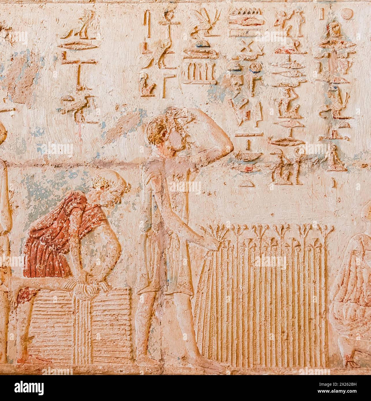 Ägypten, Thunfisch el Gebel, Grab von Petosiris, Flachsernte, Bündelung. Stockfoto
