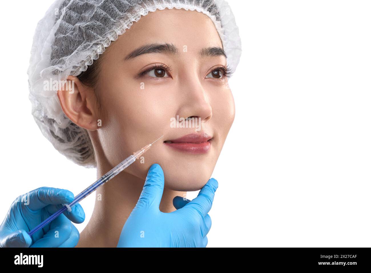 Junge Frauen bei Gesichtsinjektionen in der medizinischen Schönheitschirurgie Stockfoto