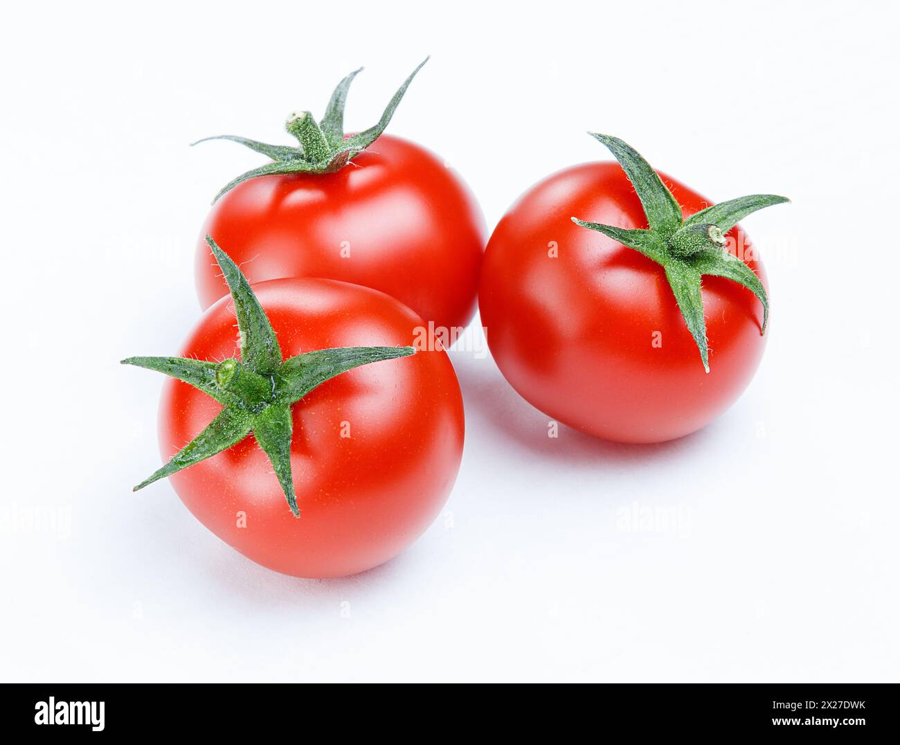 Tomaten auf dem weißen Hintergrund Stockfoto