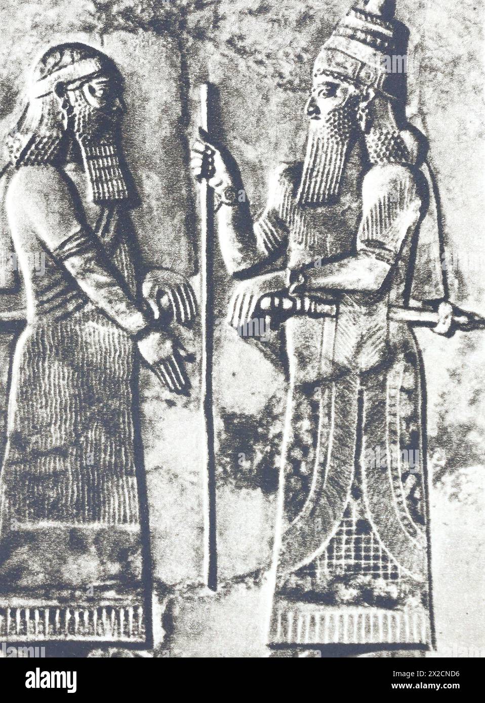 Relief mit Sargon II. Und seinem Wesir. Foto aus der Mitte des 20. Jahrhunderts. Stockfoto