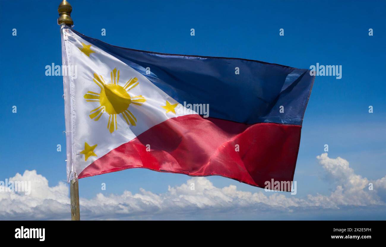 Die Fahne von Philippinen, flattert im Wind, isoliert, gegen den blauen Himmel Stockfoto