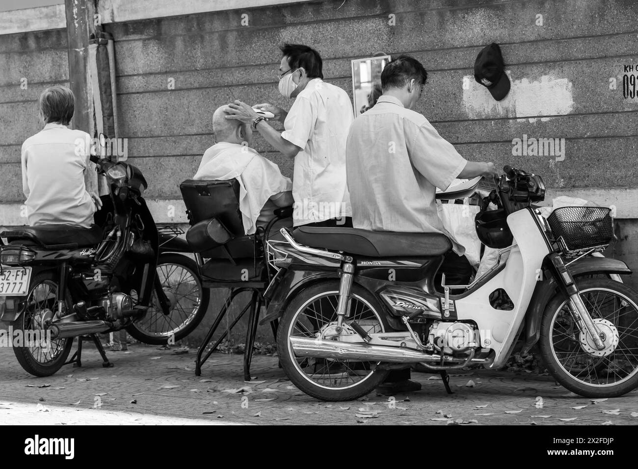 Vietnam, Ho-Chi-Minh-Stadt, Saigon, Straßenfriseur Stockfoto