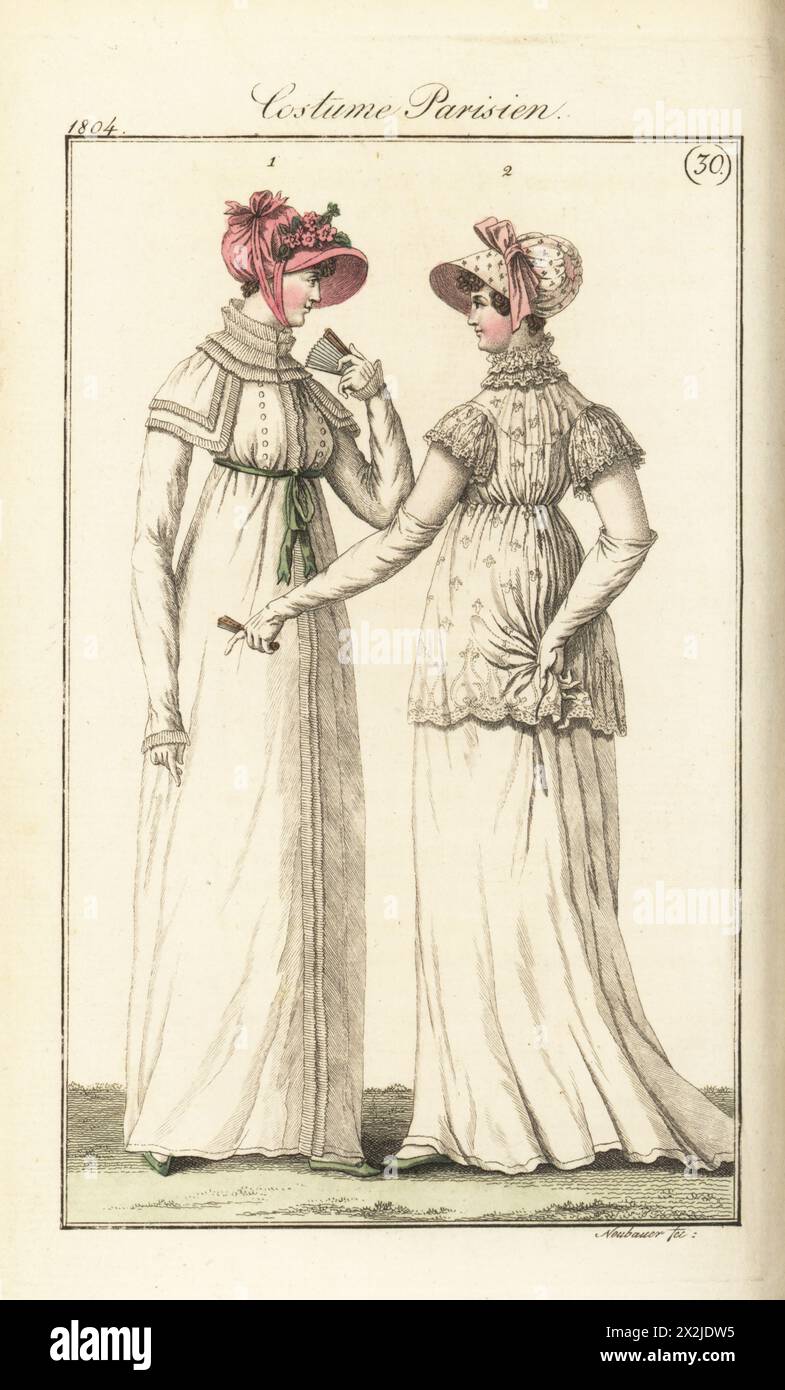 Französin in rosafarbener Taffeta-Kapuze, Morgenreitmantel in Perkale 1 und Frau in Kapuze mit Band, kurze Tunika über weißem Kleid 2. Redingote du matin en perkale 1 (PL. 564). Capote rosee, tunique sans ouverture 2 (PL. 562 aus der Pariser Ausgabe). Handkolorierter Kupferstich von Friedrich Ludwig Neubauer aus Pierre de la Messengere’s Journal des Dames et des Modes, Francfort sur le mein (Frankfurt) 1804. Nach Illustrationen von Carle Vernet, Jean-Francois Bosio, Dominique Bosio und Philibert Louis Debucourt. Stockfoto
