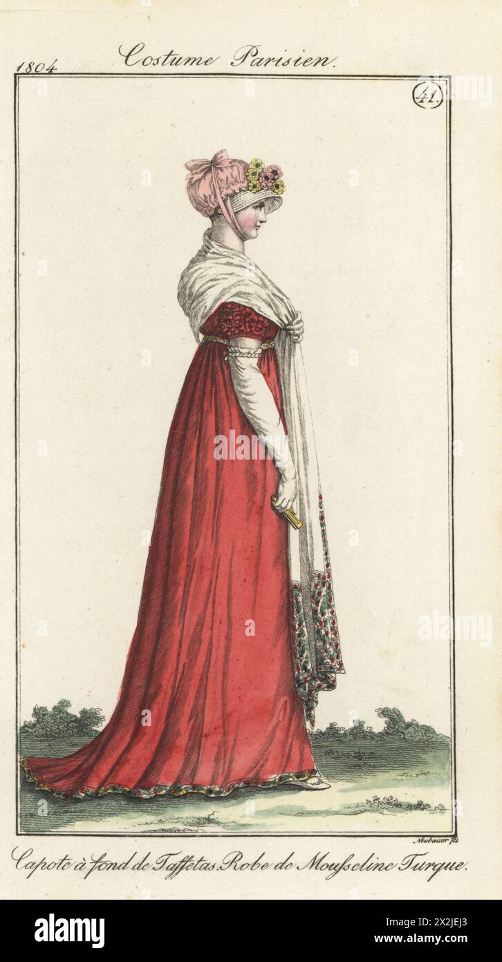 Französin in rosafarbener Taffeta-Kapuze, rotem türkischem Musselin-Kleid, gesticktem weißem Schal. Pl. 583 in der Pariser Ausgabe. Capote a Fond de Taffetas Rose, Robe de Mousseline Turque rouge. Handkolorierter Kupferstich von Friedrich Ludwig Neubauer aus Pierre de la Messengere’s Journal des Dames et des Modes, Francfort sur le mein (Frankfurt) 1804. Nach Illustrationen von Carle Vernet, Jean-Francois Bosio, Dominique Bosio und Philibert Louis Debucourt. Stockfoto