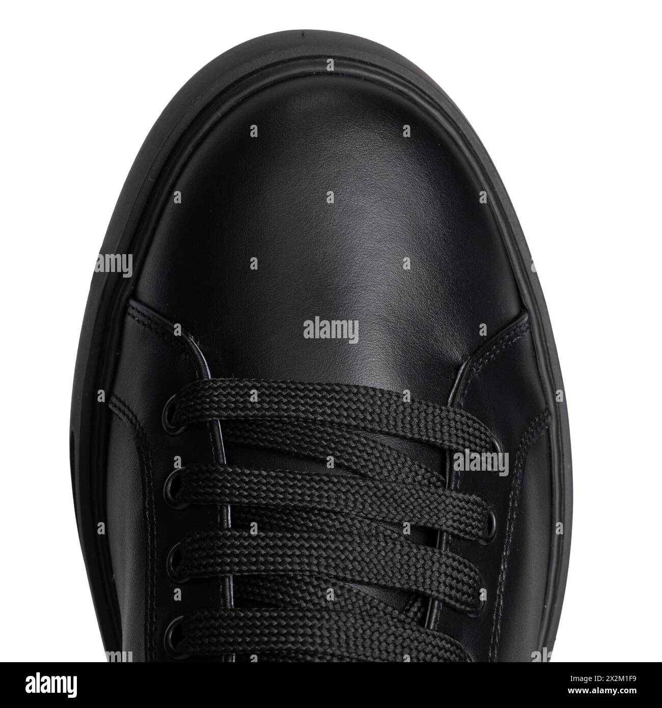 Klassischer schwarzer Sneaker mit Draufsicht Stockfoto