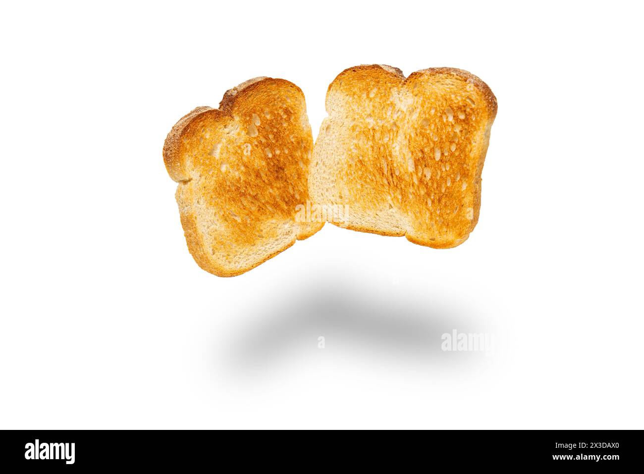Scheiben Weißbrot, geröstet auf einer schwarzen Schale. Stockfoto