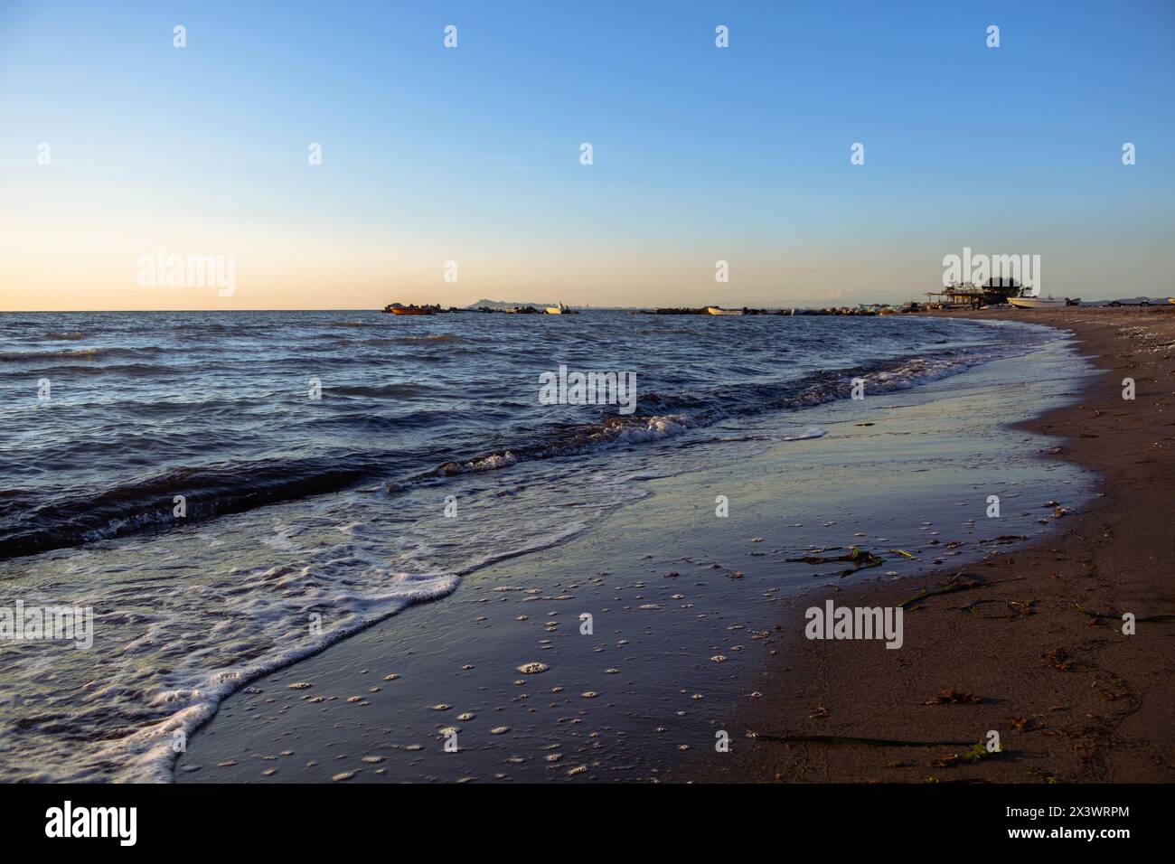 "Ein ruhiger Zufluchtsort, bei dem das einzige auf der Tagesordnung ist, zu beobachten, wie die Sonne sich von dem Tag verabschiedet." Stockfoto