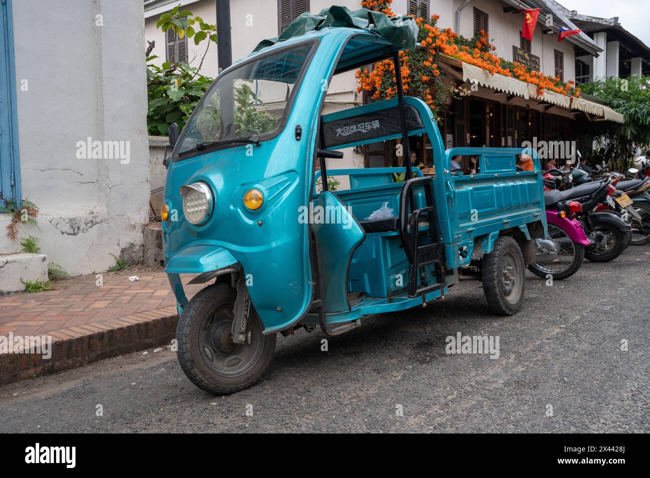 Tuk Tuk Taxi in der Altstadt von Luang Prabang in Laos Südostasien Stockfoto