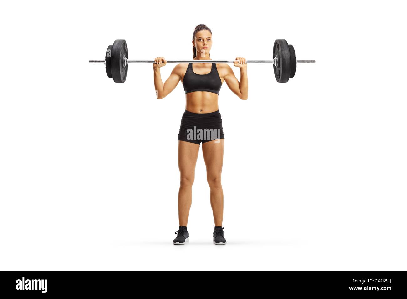 Junge Frau, die Gewichtstraining isoliert auf weißem Hintergrund ausübt, Bodybuilding-Konzept Stockfoto